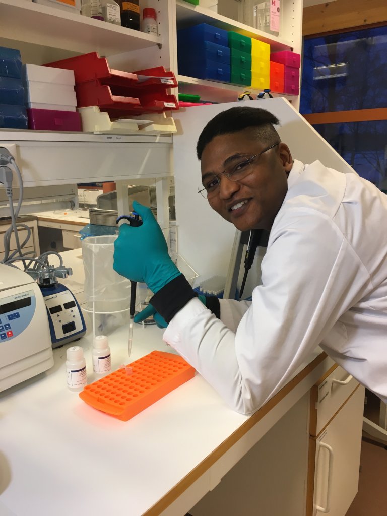 NIBIO researcher Simo Maduna is the first author of the new study on pink salmon. He was recently nominated for the prestigious International Young Scientist Award for his work. Photo: Private